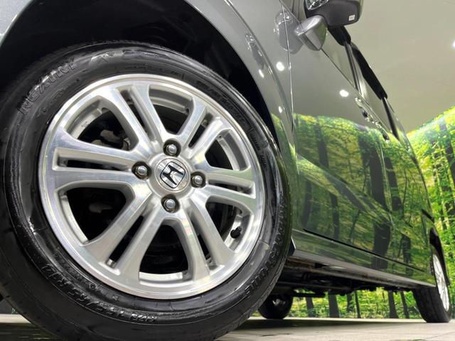 Ｎ－ＢＯＸカスタム Ｇ・Ｌパッケージ　４ＷＤ　ＤＡ　バックカメラ　電動スライドドア　寒冷地仕様　禁煙車　スマートキー　ＨＩＤヘッド　ＥＴＣ　Ｂｌｕｅｔｏｏｔｈ　ＣＤ　ＤＶＤ再生　純正１４インチアルミ　オートライト　オートエアコン（14枚目）