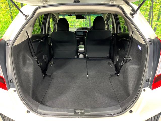 フィット 13G・Sパッケージ 4WD 純正ナビ バックカメラ 寒冷地仕様 衝突軽減 禁煙車 ドラレコ LEDヘッド ETC クルコン 純正15インチAW オートライト オートエアコン アイドリングストップ ステアリングスイッチ(11枚目)