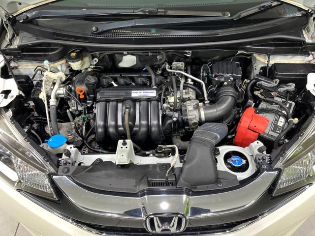 フィット 13G・Sパッケージ 4WD 純正ナビ バックカメラ 寒冷地仕様 衝突軽減 禁煙車 ドラレコ LEDヘッド ETC クルコン 純正15インチAW オートライト オートエアコン アイドリングストップ ステアリングスイッチ(19枚目)