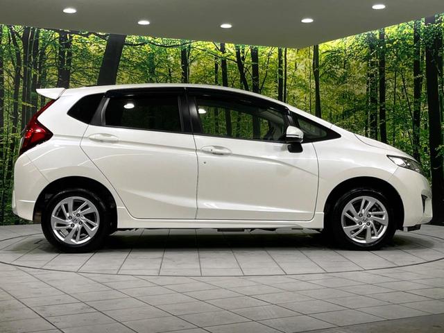 フィット 13G・Sパッケージ 4WD 純正ナビ バックカメラ 寒冷地仕様 衝突軽減 禁煙車 ドラレコ LEDヘッド ETC クルコン 純正15インチAW オートライト オートエアコン アイドリングストップ ステアリングスイッチ(67枚目)