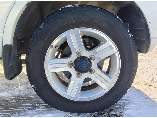 ジムニー ワイルドウインド　４ＷＤ　ＥＴＣ　シートヒーター　ミラーヒーター　純正アルミホイール　キーレス　禁煙車　ＡＢＳ（42枚目）