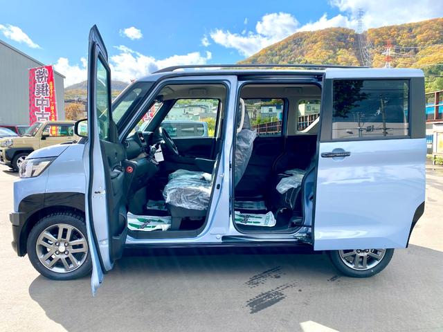 デリカミニ T プレミアム 届出済み未使用車 E-Assist 両側電動スライドドア アダプティブクルーズコントロール ルーフレール マイルドハイブリッド 全方位カメラ LEDヘッドライト ステアリングヒーター フルタイム4WD(6枚目)