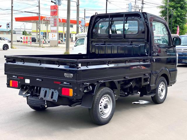 キャリイトラック KCエアコン・パワステ 届出済み未使用車 キーレスエントリー パートタイム4WD ハロゲンヘッドライト オートライト 純正スピーカー付きラジオ スチールホイール クリアランスソナー(8枚目)