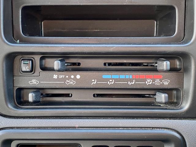 ハイゼットカーゴ ＤＸ　キーレスエントリー　両側スライドドア　ハロゲンヘッドライト　パートタイム４ＷＤ　純正スピーカー付きラジオ　パワーステアリング　パワーウインドウ　マニュアルエアコン（31枚目）