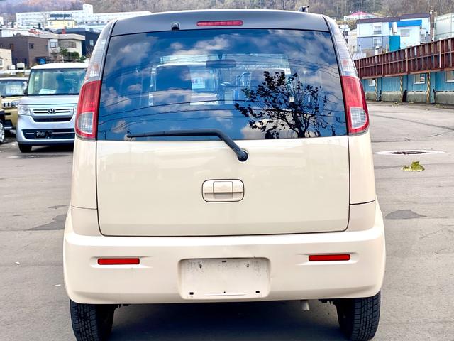 ＭＲワゴン Ｇ　キーレスエントリー　電動格納ミラー　シートヒーター　社外ナビゲーション　マニュアルエアコン　ハロゲンヘッドライト　フロントフォグランプ　フルタイム４ＷＤ（8枚目）