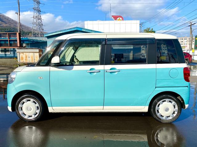 ムーヴキャンバス Ｘ　ＳＡＩＩＩ　スマートアシスト　スマートキー　プッシュスタート　両側電動スライドドア　電動格納ミラー　社外ナビゲーション　バックカメラ　アイドリングストップ　横滑り防止　フルタイム４ＷＤ（4枚目）