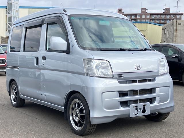 ハイゼットカーゴ クルーズターボ 5速マニュアル車 パートタイム4WD キーレスエントリー 社外ステアリング 純正積込 電動格納ミラー パワーステアリング パワーウインドウ エアコン 社外オーディオ(14枚目)