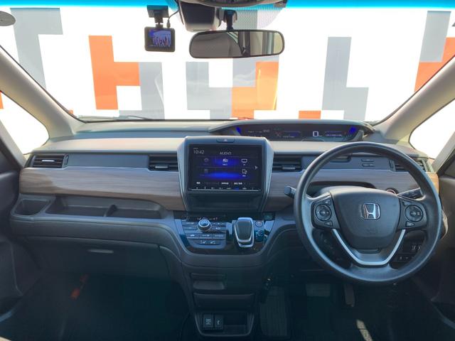 フリードハイブリッド ハイブリッド・Ｇ　当社レンタカーアップ・純正ナビ・フルセグ・ＣＤ／ＤＶＤ・Ｂｌｕｅｔｏｏｔｈ接続・バックカメラ・両側電動スライドドア・社外前側ドライブレコーダー・純正フロアマット・オートＬＥＤヘッドライト・（3枚目）