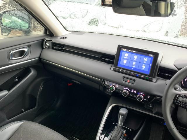 ヴェゼル ｅ：ＨＥＶＺ　ホンダセンシング・純正ナビ・フルセグ・ＣＤ／ＤＶＤ・Ｂｌｕｅｔｏｏｔｈ接続・バックカメラ・パーキングセンサー・社外ドライブレコーダー前後・純正フロアマット・前列シートヒーター・オートＬＥＤヘッドライト（13枚目）