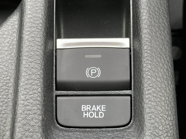 ヴェゼル ｅ：ＨＥＶＺ　ホンダセンシング・純正ナビ・フルセグ・ＣＤ／ＤＶＤ・Ｂｌｕｅｔｏｏｔｈ接続・バックカメラ・パーキングセンサー・社外ドライブレコーダー前後・純正フロアマット・前列シートヒーター・オートＬＥＤヘッドライト（23枚目）