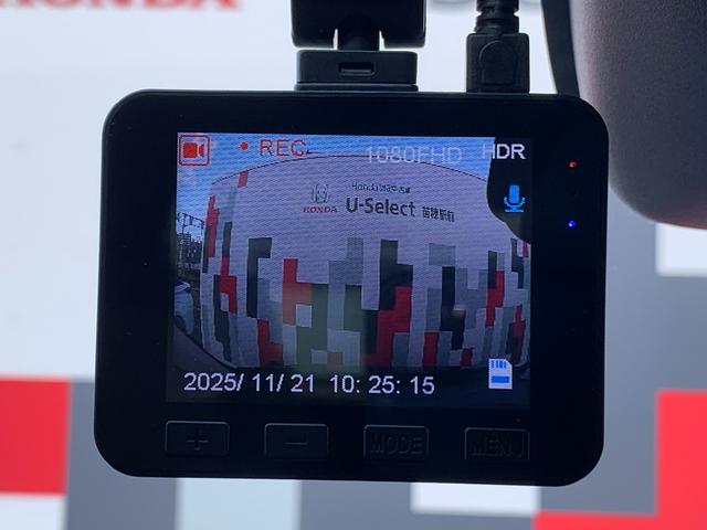 フリード ｅ：ＨＥＶエアー　当社レンタカーアップ・純正ナビ・フルセグ・ＵＳＢ接続・Ｂｌｕｅｔｏｏｔｈ接続・バックカメラ・社外前側ドライブレコーダー・オートＬＥＤヘッドライト・両側電動スライドドア・パーキングセンサー・ＥＴＣ・（27枚目）