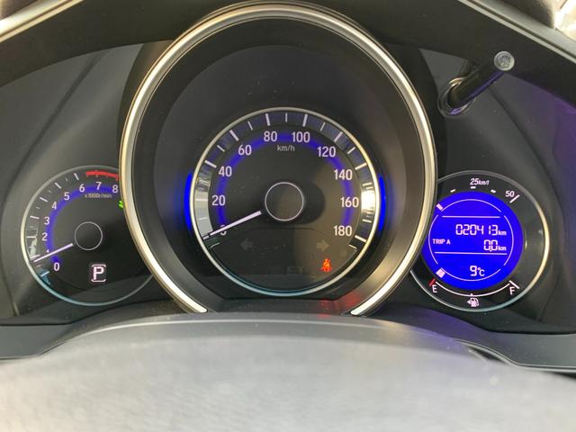 フィット １３Ｇ・Ｌパッケージ　純正ナビ・ＣＤ・ＵＳＢ接続・Ｂｌｕｅｔｏｏｔｈ接続・バックカメラ・純正フロアマット・サイドカーテンエアバック・オートエアコン・オートヘッドライト・社外アルミホイール４本・純性スチールホイール４本（9枚目）