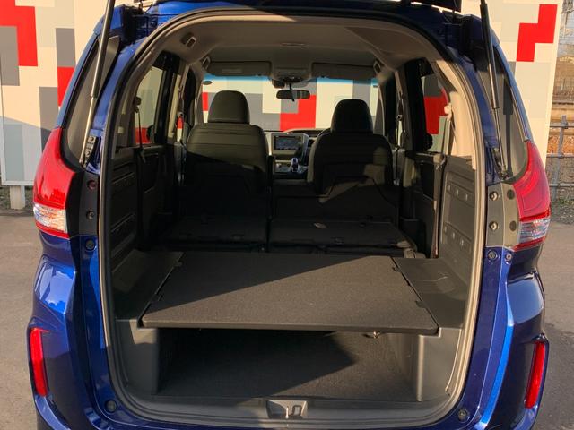 フリード＋ハイブリッド ハイブリッドＧ・ホンダセンシング　ホンダセンシング・純正ナビ・フルセグ・ＣＤ／ＤＶＤ・Ｂｌｕｅｔｏｏｔｈ接続・バックカメラ・両側電動スライドドア・左側サイドステップ・純正エンジンスターター・前列シートヒーター・純正フロアマット・ＥＴＣ（54枚目）