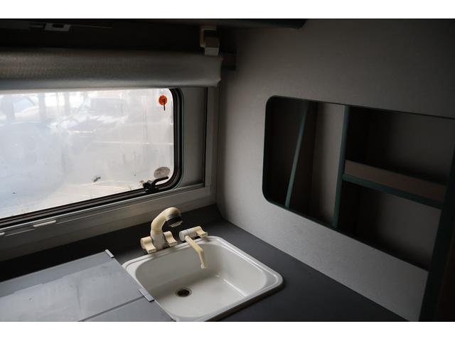 エルフトラック キャンピングカー TERRA500 4WD(切替) ディーゼル 5速マニュアル 7人乗り(30枚目)