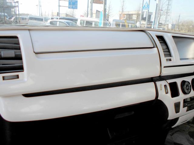 ハイエースバン ロングスーパーＧＬ　４ＷＤ　５ドア　２．５ＤＴ　両側スライド　４型フェイス＆スポイラー　ＬＥＤヘッド＆フォグ　革調シートカバー　エアロボンネット　リアヒーター＆クーラー　タイミングベルト交換済（35枚目）