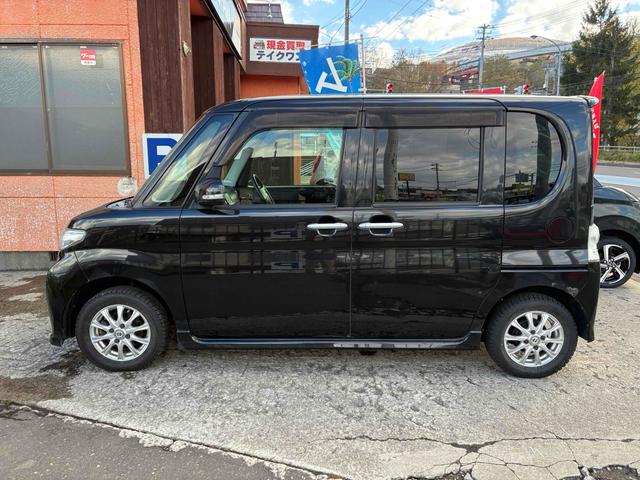 タント カスタムＸ　車検９年４月　社外ナビＴＶ　左パワースライド　４ＷＤ　ＥＴＣ　電動スライドドア　ＴＶ　ＨＩＤ　スマートキー　アイドリングストップ　ベンチシート　ＣＶＴ　盗難防止システム　ＡＢＳ　ＣＤ　ＤＶＤ再生　Ｂｌｕｅｔｏｏｔｈ　アルミホイール　衝突安全ボディ（15枚目）