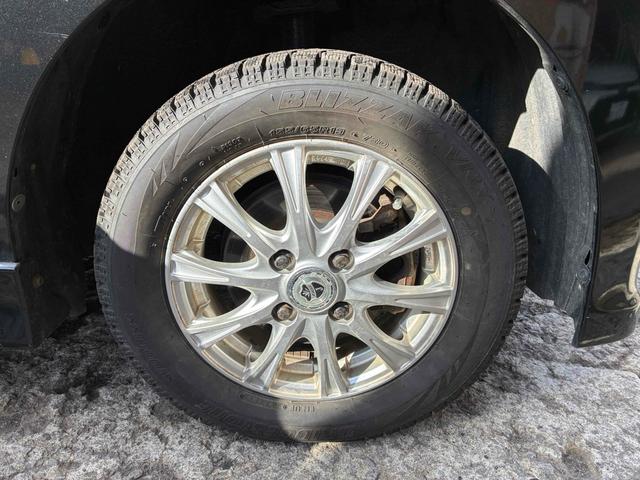 タント カスタムＸ　車検９年４月　社外ナビＴＶ　左パワースライド　４ＷＤ　ＥＴＣ　電動スライドドア　ＴＶ　ＨＩＤ　スマートキー　アイドリングストップ　ベンチシート　ＣＶＴ　盗難防止システム　ＡＢＳ　ＣＤ　ＤＶＤ再生　Ｂｌｕｅｔｏｏｔｈ　アルミホイール　衝突安全ボディ（16枚目）