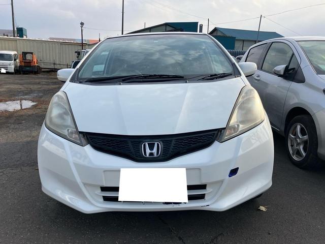 フィット Ｇ　パワーステアリング　ＡＢＳ　エアコン　盗難防止システム　衝突安全ボディ　パワーウィンドウ　パワーステアリング　エアバッグ（運転席・助手席）　ＥＴＣ（2枚目）