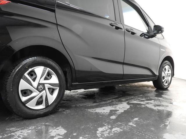 フリードハイブリッド ハイブリッド・Ｇホンダセンシング　４ＷＤ　両側パワースライドドア　ナビ　ｂｌｕｅｔｏｏｔｈ　衝突被害軽減ブレーキ　スマートキー　プッシュスタート　前席シートヒーター　ＥＴＣ（11枚目）