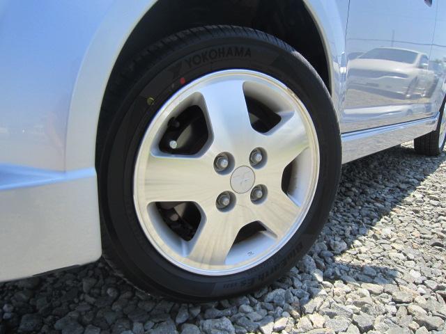 ｅＫスポーツ Ｒ　４ＷＤターボ　走行６７０００ｋｍ　純正ナビ　ＥＴＣ　シートヒーター　キーレス　純正１４アルミ　エアロ　フォグ　ドアバイザー　スタッドレス＋アルミセット積込み　道外仕入れ　１年間走行無制限保証付（18枚目）