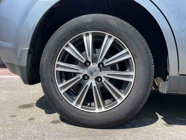 ティーダ １５Ｍ　ＦＯＵＲ　４ＷＤ　ナビ　アルミホイール　オートライト　スマートキー　電動格納ミラー　ＡＴ　衝突安全ボディ　ベンチシート　ＡＢＳ　エアコン　パワーステアリング　パワーウィンドウ（20枚目）