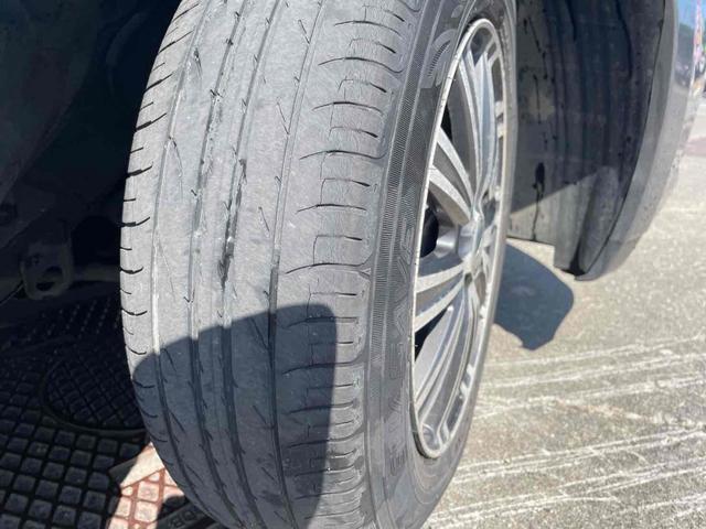 ティーダ １５Ｍ　ＦＯＵＲ　４ＷＤ　ナビ　アルミホイール　オートライト　スマートキー　電動格納ミラー　ＡＴ　衝突安全ボディ　ベンチシート　ＡＢＳ　エアコン　パワーステアリング　パワーウィンドウ（22枚目）