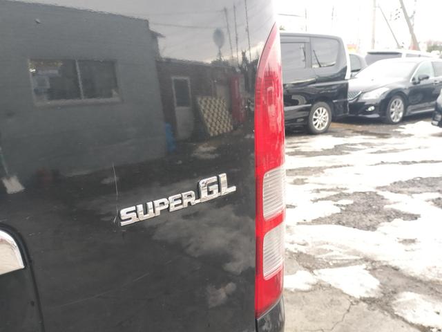 ハイエースバン ロングスーパーＧＬ　４ＷＤ　本州仕入れ　新品シートカバー　社外アルミ　ホワイトレター　社外ＳＤナビ　フルセグ　バックカメラ（10枚目）