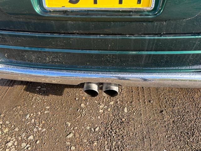 ミラジーノ ミニライトスペシャル　１５インチ　ミニライトホイール　ローダウン　ダウンサス社外センターマフラー　２本出し　バックカメラ　タイミングベルト交換済　夏冬タイヤ　ナビＴＶ　フォグランプ　革調シート　４ＷＤ（21枚目）