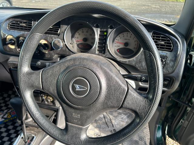 ミラジーノ ミニライトスペシャル　１５インチ　ミニライトホイール　ローダウン　ダウンサス社外センターマフラー　２本出し　バックカメラ　タイミングベルト交換済　夏冬タイヤ　ナビＴＶ　フォグランプ　革調シート　４ＷＤ（23枚目）