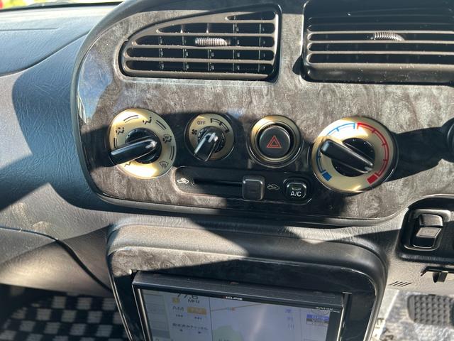 ミラジーノ ミニライトスペシャル　１５インチ　ミニライトホイール　ローダウン　ダウンサス社外センターマフラー　２本出し　バックカメラ　タイミングベルト交換済　夏冬タイヤ　ナビＴＶ　フォグランプ　革調シート　４ＷＤ（32枚目）