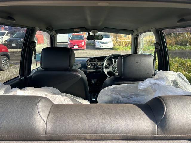 ミラジーノ ミニライトスペシャル　１５インチ　ミニライトホイール　ローダウン　ダウンサス社外センターマフラー　２本出し　バックカメラ　タイミングベルト交換済　夏冬タイヤ　ナビＴＶ　フォグランプ　革調シート　４ＷＤ（65枚目）