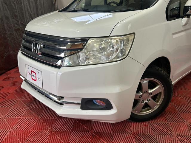 ステップワゴン G コンフォートセレクション 4WD キーレス スマートキー アイドリングストップ 衝突安全ボディ 盗難防止システム 3列シート フルフラット ウォークスルー パワーステアリング パワーウィンドウ ABS(3枚目)