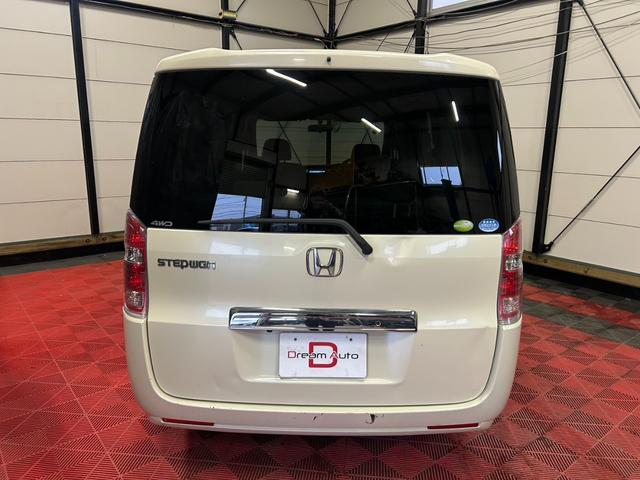 ステップワゴン G HIDエディション 4WD HID キーレス 盗難防止システム 衝突安全ボディ 3列シート フルフラット ウォークスルー HID エアバッグ(運転席・助手席) パワーウィンドウ パワーステアリング(5枚目)
