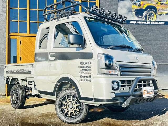 スーパーキャリイ Xリミテッド 届出済未使用車/EN-リフトアップカスタム/2.2インチリフトアップ/強化コイル/マッドスターATタイヤ/PPXアルミ/しし狩りバンパー/ルーフラックバー/LEDワークライト/LEDテール/荷台マット(3枚目)