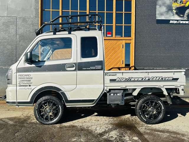スーパーキャリイ Xリミテッド 届出済未使用車/EN-リフトアップカスタム/2.2インチリフトアップ/強化コイル/マッドスターATタイヤ/PPXアルミ/しし狩りバンパー/ルーフラックバー/LEDワークライト/LEDテール/荷台マット(6枚目)
