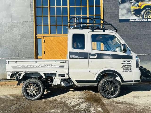 スーパーキャリイ Xリミテッド 届出済未使用車/EN-リフトアップカスタム/2.2インチリフトアップ/強化コイル/マッドスターATタイヤ/PPXアルミ/しし狩りバンパー/ルーフラックバー/LEDワークライト/LEDテール/荷台マット(7枚目)