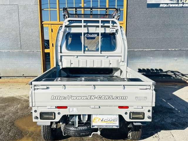 スーパーキャリイ Xリミテッド 届出済未使用車/EN-リフトアップカスタム/2.2インチリフトアップ/強化コイル/マッドスターATタイヤ/PPXアルミ/しし狩りバンパー/ルーフラックバー/LEDワークライト/LEDテール/荷台マット(9枚目)