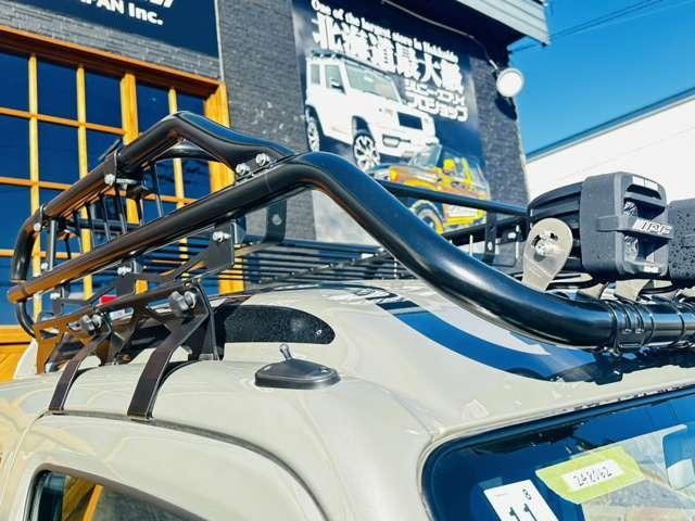 スーパーキャリイ Xリミテッド 届出済未使用車/EN-リフトアップカスタム/2.2インチリフトアップ/強化コイル/マッドスターATタイヤ/PPXアルミ/しし狩りバンパー/ルーフラックバー/LEDワークライト/LEDテール/荷台マット(11枚目)