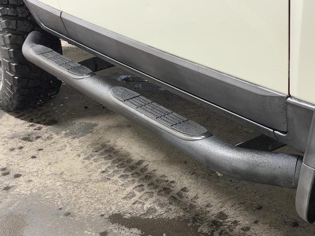 ＦＪクルーザー カラーパッケージ　夏・冬タイヤ付／ＰＥＮＤＬＴＯＮシートカバー／ＢａｊａＲａｃｋルーフキャリア／寒冷地仕様／Ｆ１インチアップ／ブラックグリル／ドラレコ付デジタルミラー／サイドステップ／純正ナビ＆ＴＶ／バックカメラ（13枚目）