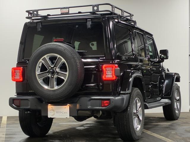 ジープ・ラングラーアンリミテッド サハラ　１オーナー／ルーフキャリア／ＡｐｐｌｅＣａｒＰｌａｙ＆ＡｎｄＡｕｔｏ／アルパイン／純正１８インチＡＷ／黒革／シートヒーター／ステアリングヒーター／オートハイビーム／追従クルコン／純正ナビ＆ＴＶ（7枚目）