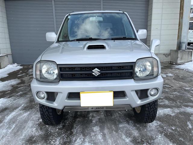 ジムニー ＸＣ　スズキスポーツサス１インチアップ　オープンカントリー／アルミ　冬タイヤアルミセット付　ＪＡＯＳスキッドガード　社外マフラー　電格ミラー　ナビ　ＴＶ　キーレス　リモスタ　ＡＴ　　ＡＢＳ　　ＡＣ　　ＰＷ（2枚目）