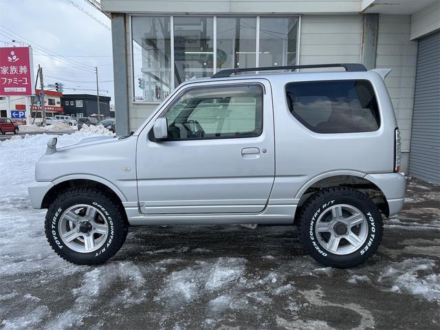 ジムニー ＸＣ　スズキスポーツサス１インチアップ　オープンカントリー／アルミ　冬タイヤアルミセット付　ＪＡＯＳスキッドガード　社外マフラー　電格ミラー　ナビ　ＴＶ　キーレス　リモスタ　ＡＴ　　ＡＢＳ　　ＡＣ　　ＰＷ（8枚目）