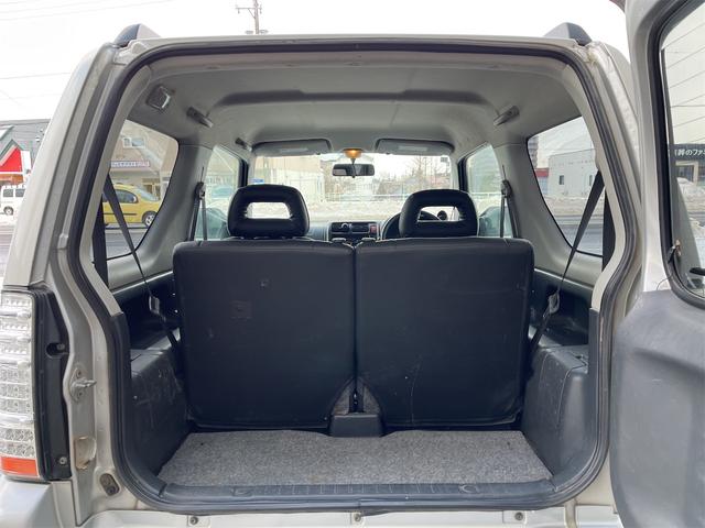 ジムニー ＸＣ　スズキスポーツサス１インチアップ　オープンカントリー／アルミ　冬タイヤアルミセット付　ＪＡＯＳスキッドガード　社外マフラー　電格ミラー　ナビ　ＴＶ　キーレス　リモスタ　ＡＴ　　ＡＢＳ　　ＡＣ　　ＰＷ（10枚目）