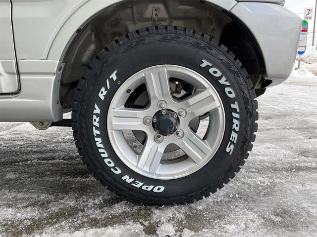 ジムニー ＸＣ　スズキスポーツサス１インチアップ　オープンカントリー／アルミ　冬タイヤアルミセット付　ＪＡＯＳスキッドガード　社外マフラー　電格ミラー　ナビ　ＴＶ　キーレス　リモスタ　ＡＴ　　ＡＢＳ　　ＡＣ　　ＰＷ（17枚目）