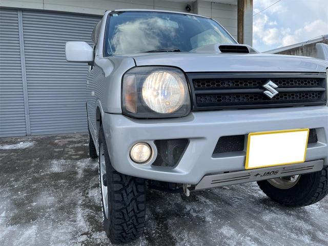 ジムニー ＸＣ　スズキスポーツサス１インチアップ　オープンカントリー／アルミ　冬タイヤアルミセット付　ＪＡＯＳスキッドガード　社外マフラー　電格ミラー　ナビ　ＴＶ　キーレス　リモスタ　ＡＴ　　ＡＢＳ　　ＡＣ　　ＰＷ（34枚目）