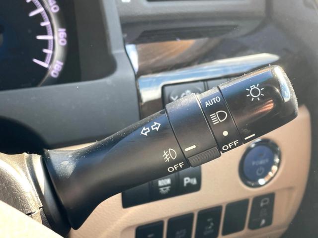 アルファードハイブリッド G 4WD 禁煙車 両側電動スライドドア フリップダウンモニター HDDナビ バックカメラ HIDヘッドライト HIDフロントフォグ スマートキー 前席パワーシート 電動オットマン ビルトインETC(25枚目)