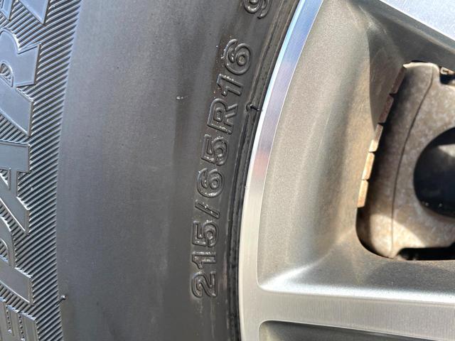 アルファードハイブリッド G 4WD 禁煙車 両側電動スライドドア フリップダウンモニター HDDナビ バックカメラ HIDヘッドライト HIDフロントフォグ スマートキー 前席パワーシート 電動オットマン ビルトインETC(44枚目)