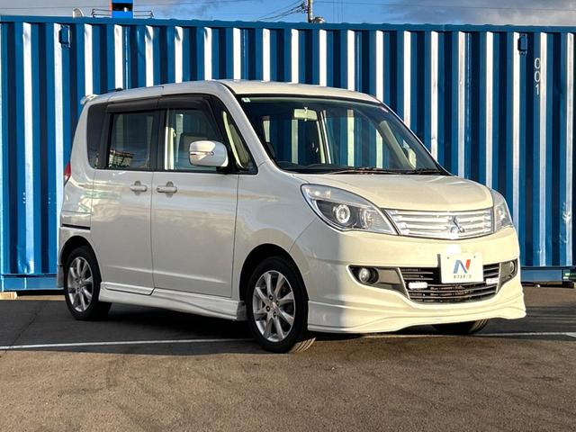 デリカＤ：２ Ｓ　４ＷＤ　禁煙車　両側電動スライドドア　オーディオ　ＨＩＤヘッドライト　スマートキー　純正１５インチＡＷ　シートヒーター　電動格納ミラー　ドアバイザー　盗難防止システム　オートライト　プライバシーガラス（15枚目）