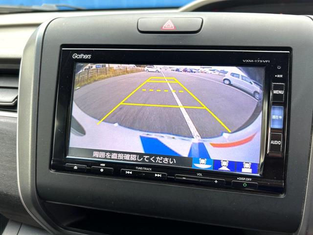 フリード Ｇ・ホンダセンシング　４ＷＤ　禁煙車　両側電動ドア　後席モニター　純正ＳＤナビ　バックカメラ　衝突被害軽減システム　レーダークルーズ　ハーフレザーシート　コーナーセンサー　スマートキー　ＬＥＤヘッド　ビルトインＥＴＣ（5枚目）