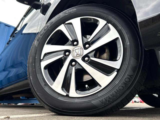 フリード Ｇ・ホンダセンシング　４ＷＤ　禁煙車　両側電動ドア　後席モニター　純正ＳＤナビ　バックカメラ　衝突被害軽減システム　レーダークルーズ　ハーフレザーシート　コーナーセンサー　スマートキー　ＬＥＤヘッド　ビルトインＥＴＣ（14枚目）